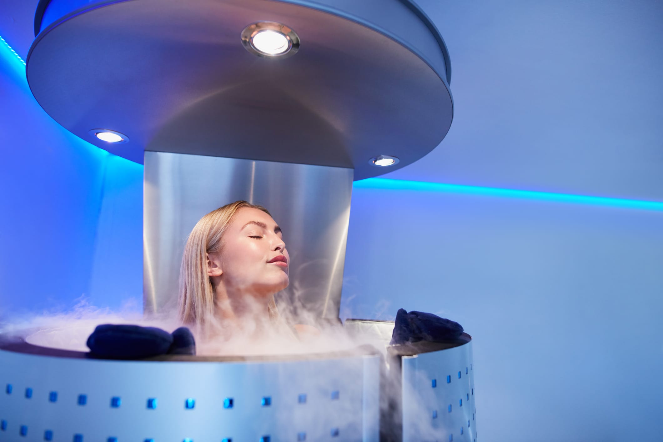 Young woman in a whole body cryo sauna
